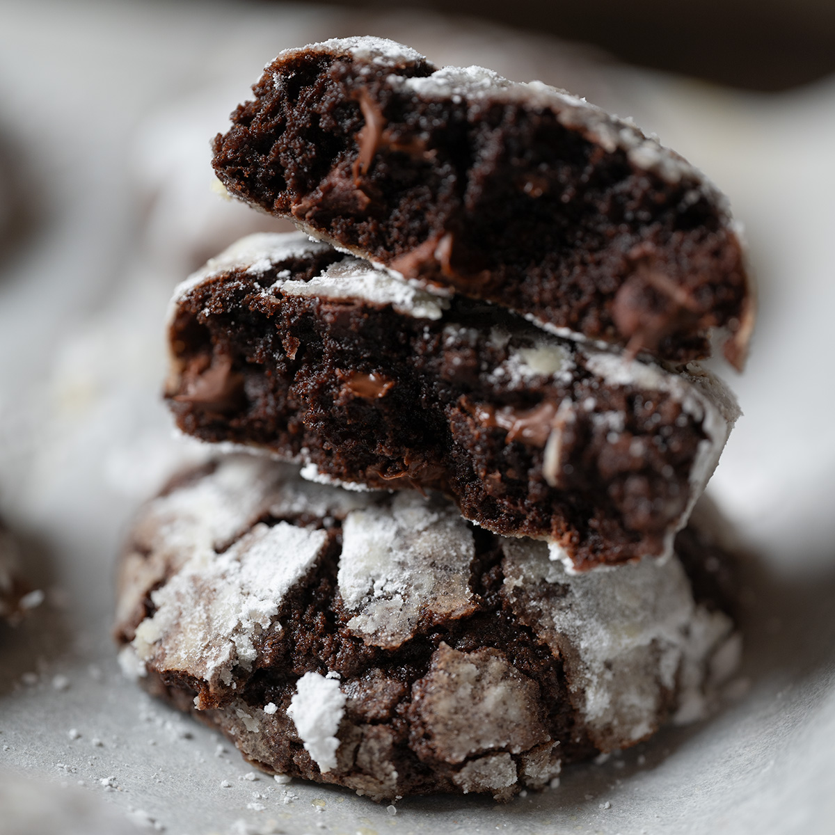The gooey, chocolaty cross-section of a crinkle cookie.