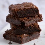 A tower of fudgy chocolate brownies.