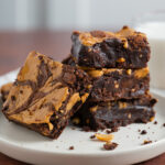 Gooey, fudgy centers of peanut butter brownies.