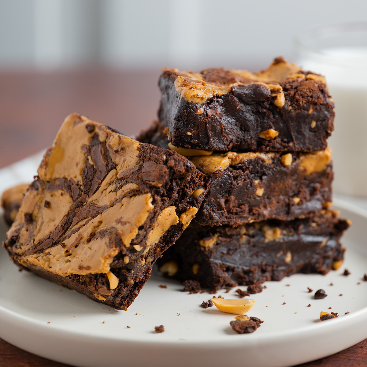 Gooey, fudgy centers of peanut butter brownies.