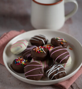 A plate of chocolate-covered Oreos.