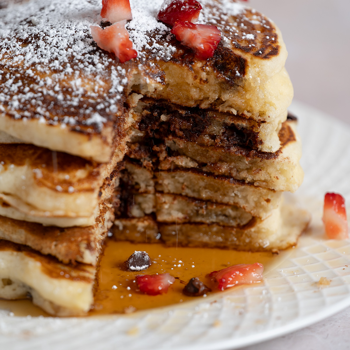 Cross section of a stack of chocolate chip pancakes.