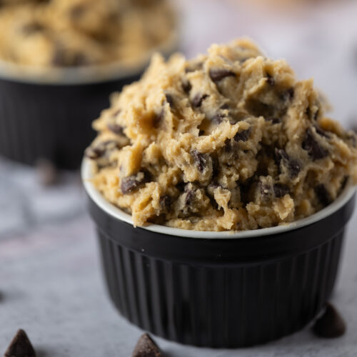 Two ramekins of edible cookie dough.