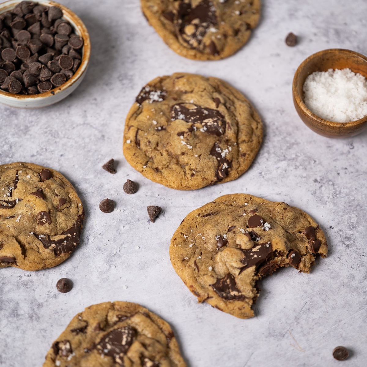 A trail of chocolate chip cookies.