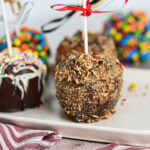 An assortment of chocolate caramel apples.
