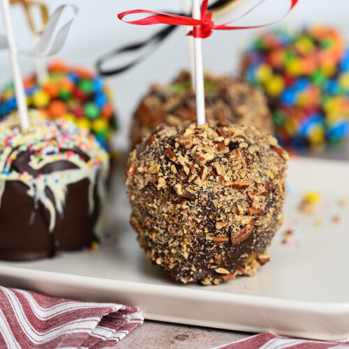 An assortment of chocolate caramel apples.